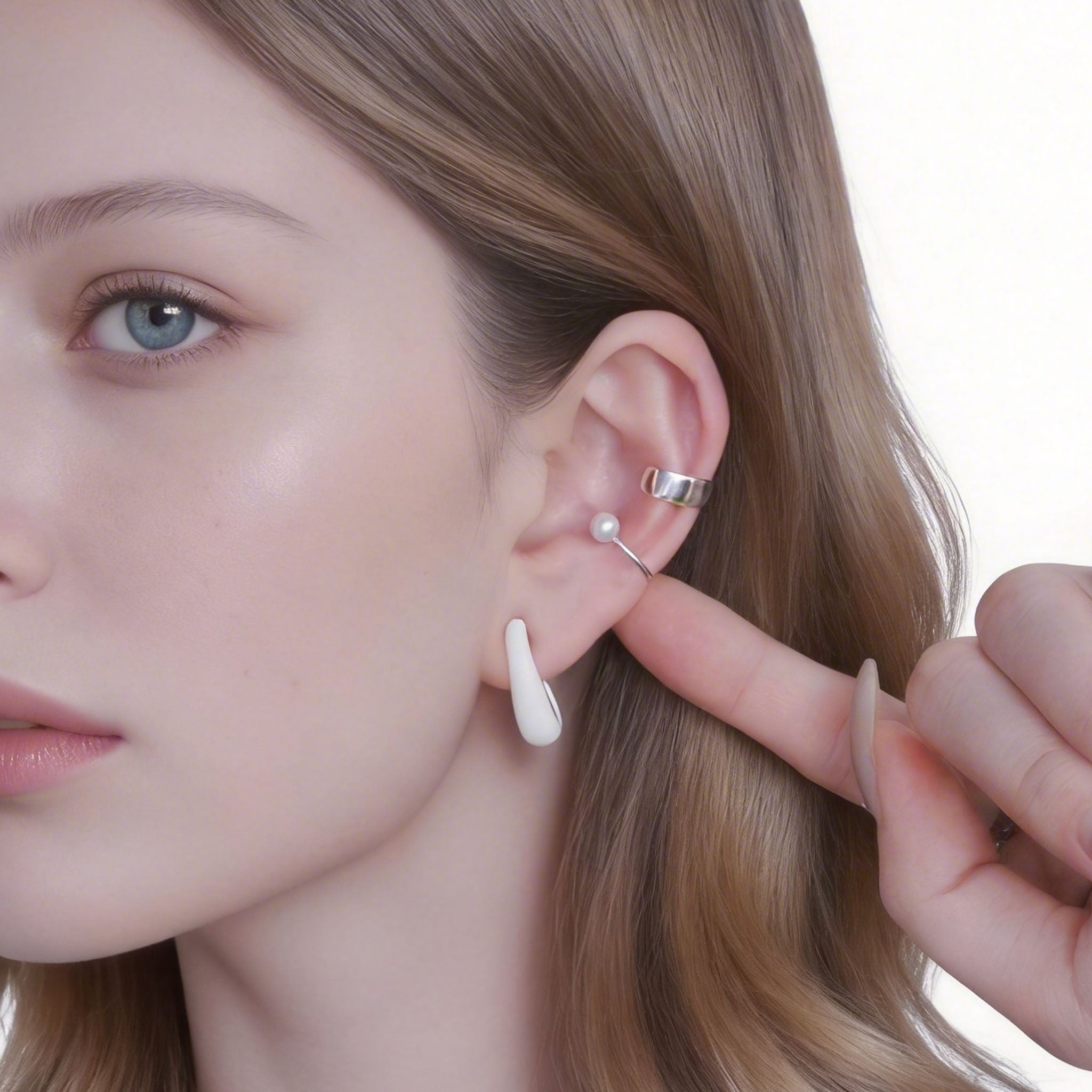 Beaded Texture Clip-On Hoop Earrings in polished silver by SOMIY for non-pierced ears.