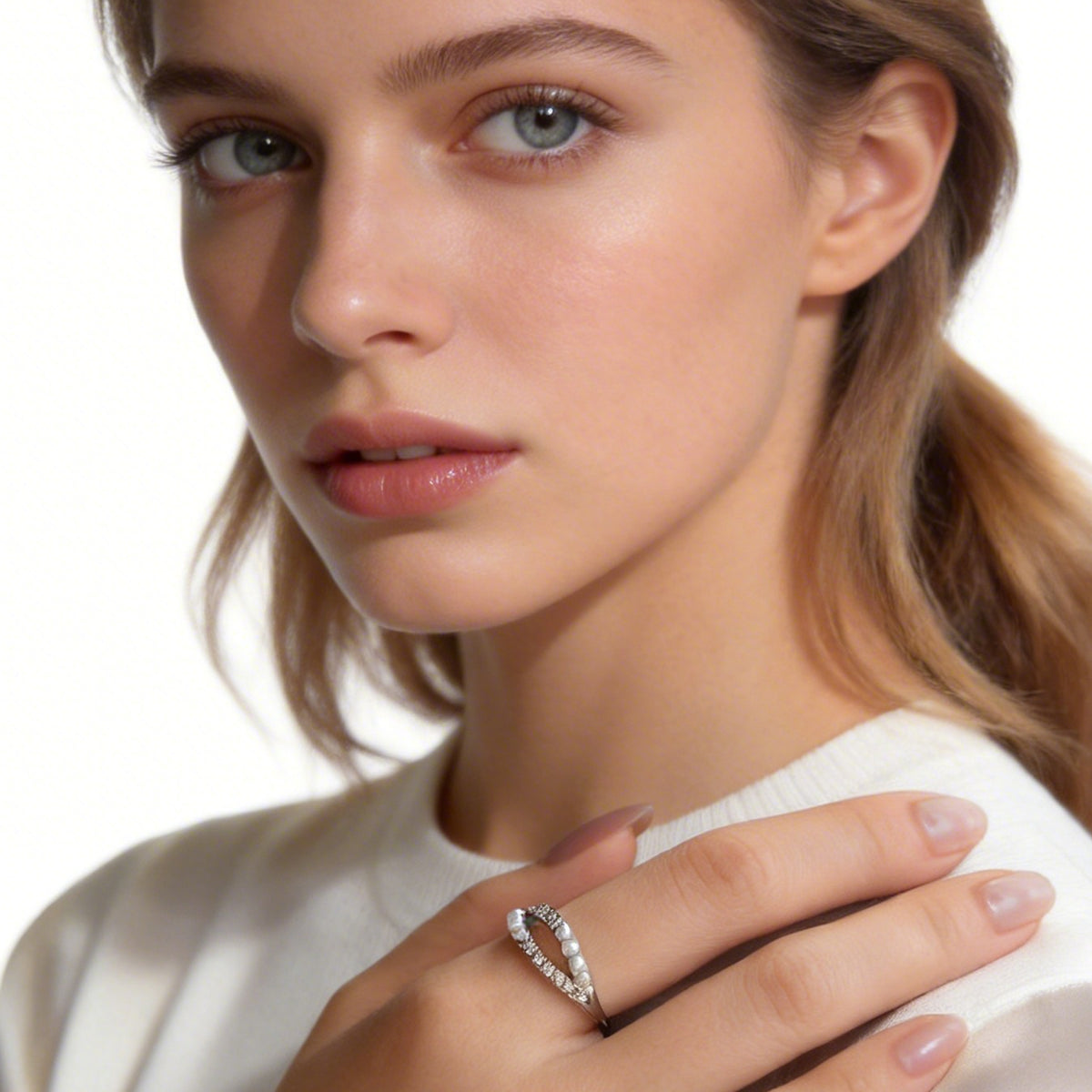 Model wearing a silver double-row sparkle ring