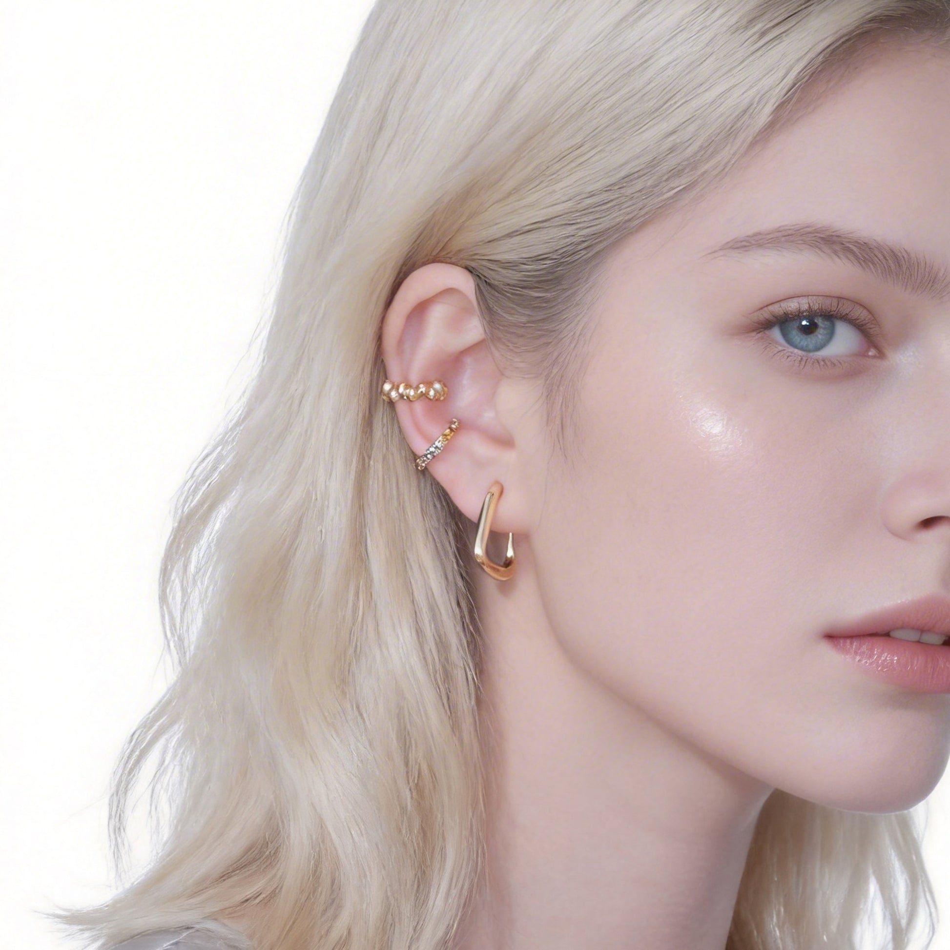 Polished Ribbed Clip-On Hoop Earrings in 18K gold plating by SOMIY for non-pierced ears.