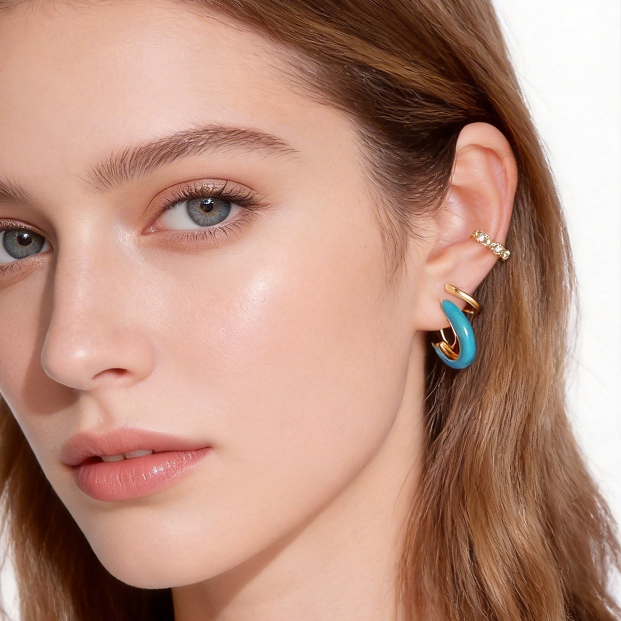 Sleek Polished Daily Clip-On Hoop Earrings in 18K gold plating by SOMIY for non-pierced ears.