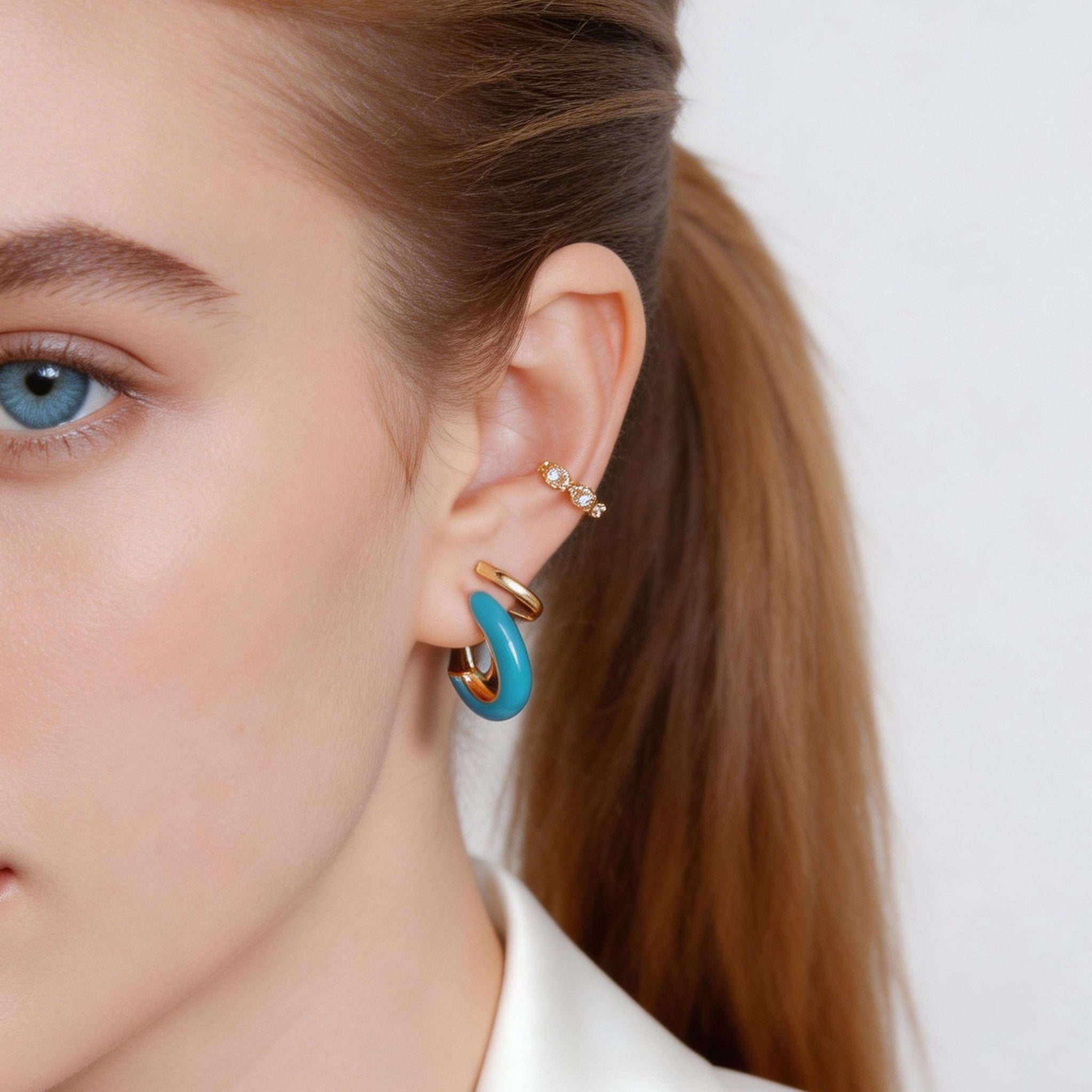 Sleek Polished Daily Clip-On Hoop Earrings in 18K gold plating by SOMIY for non-pierced ears.