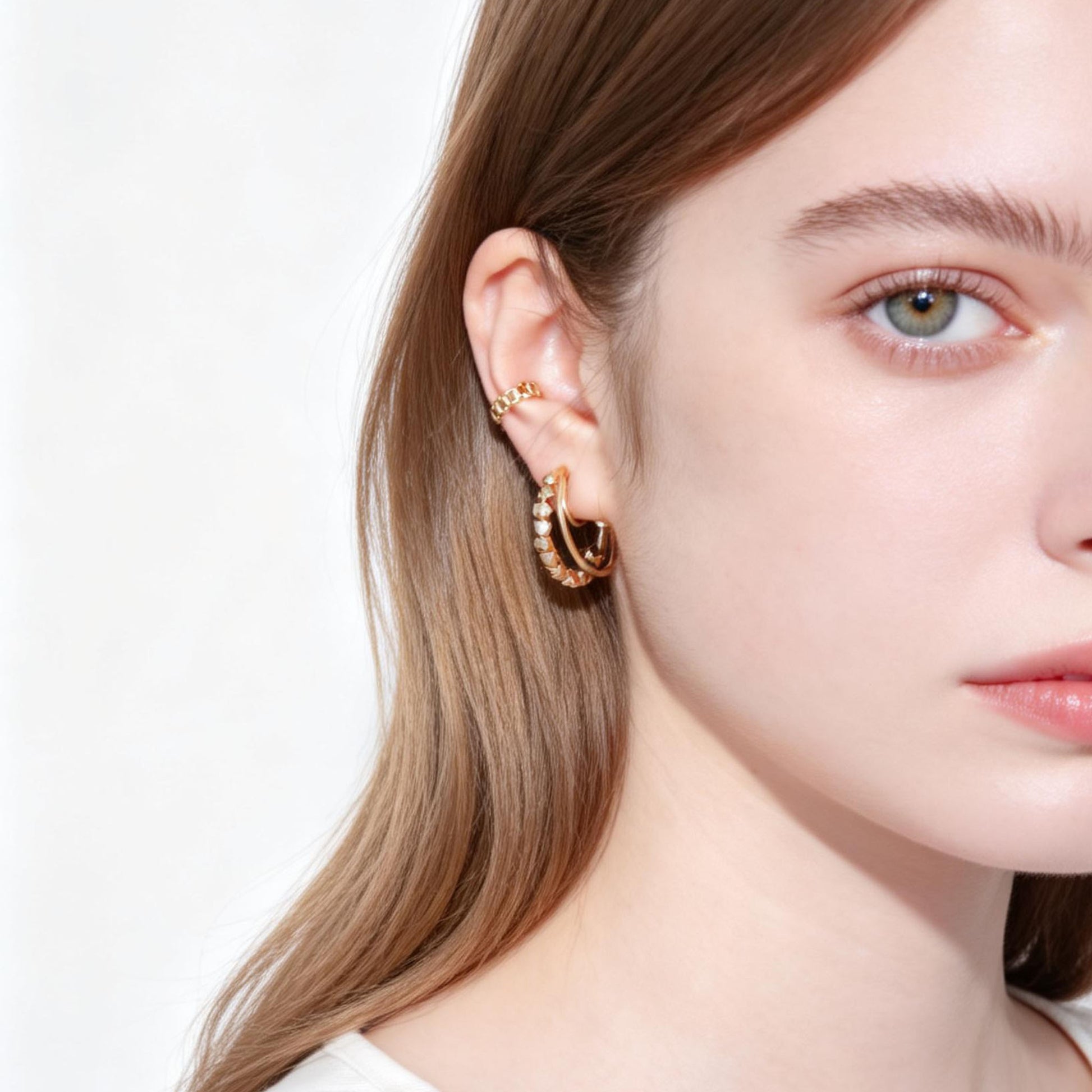 Polished Knotted Clip-On Hoop Earrings in gold and silver by SOMIY for non-pierced ears.