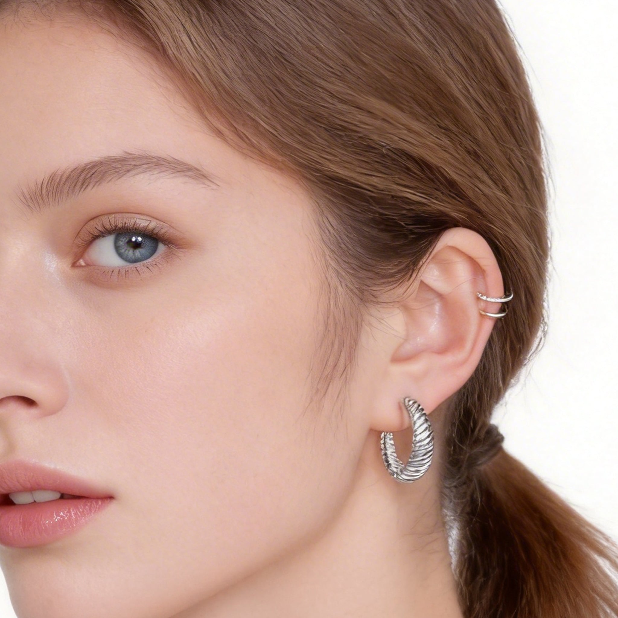 Essential Polished Medium Clip-On Hoop Earrings in 18K gold and silver by SOMIY for non-pierced ears.