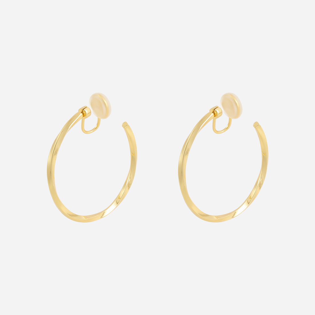Large Polished Classic Clip-On Hoop Earrings in gold and silver by SOMIY for non-pierced ears.