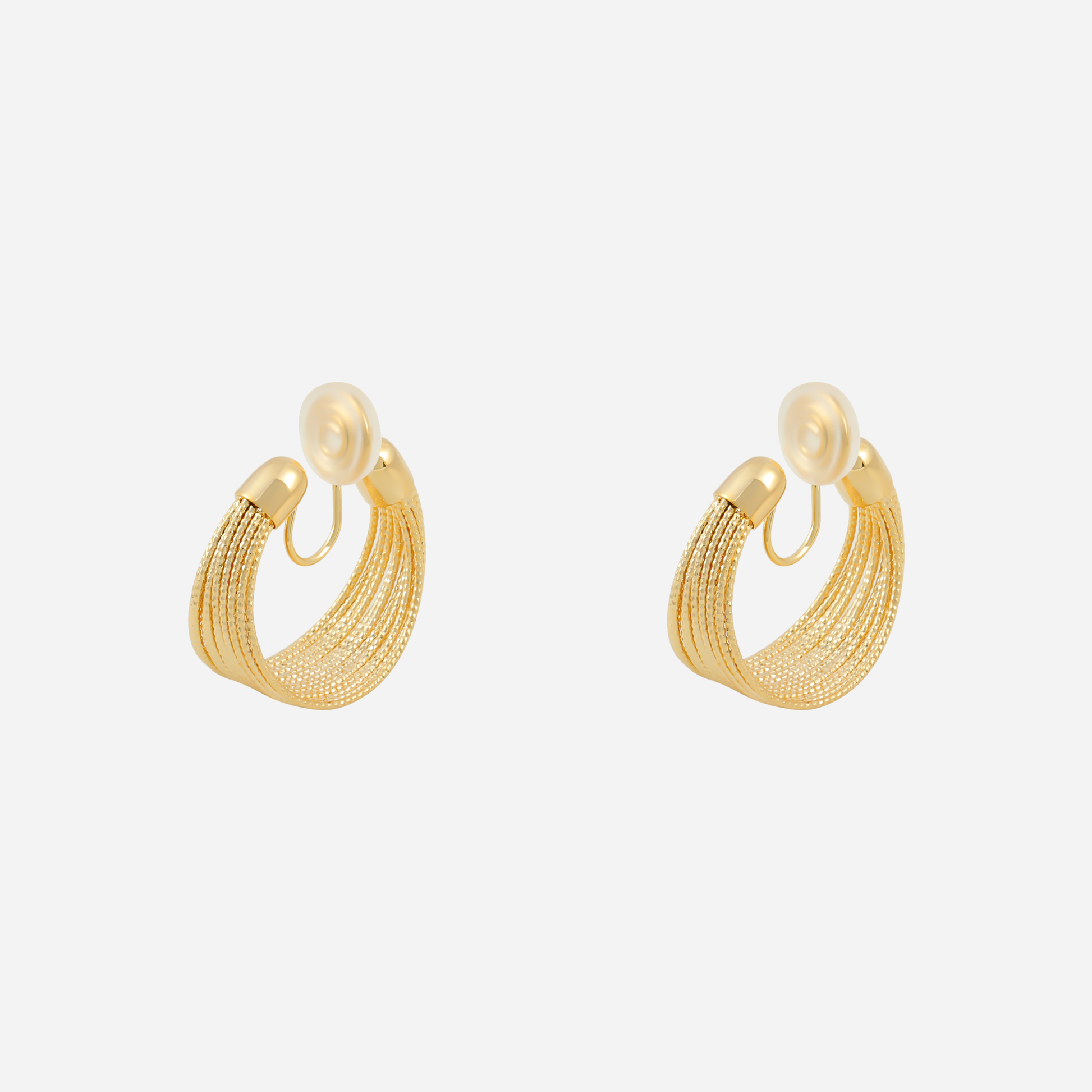 Polished Flat Clip-On Hoop Earrings in gold and silver by SOMIY for non-pierced ears.