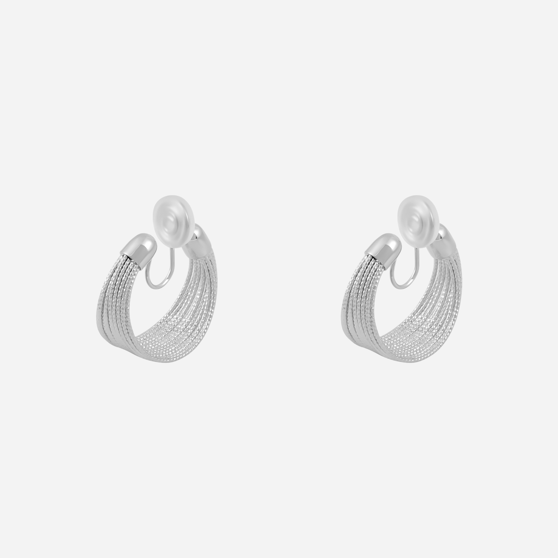 Polished Flat Clip-On Hoop Earrings in gold and silver by SOMIY for non-pierced ears.