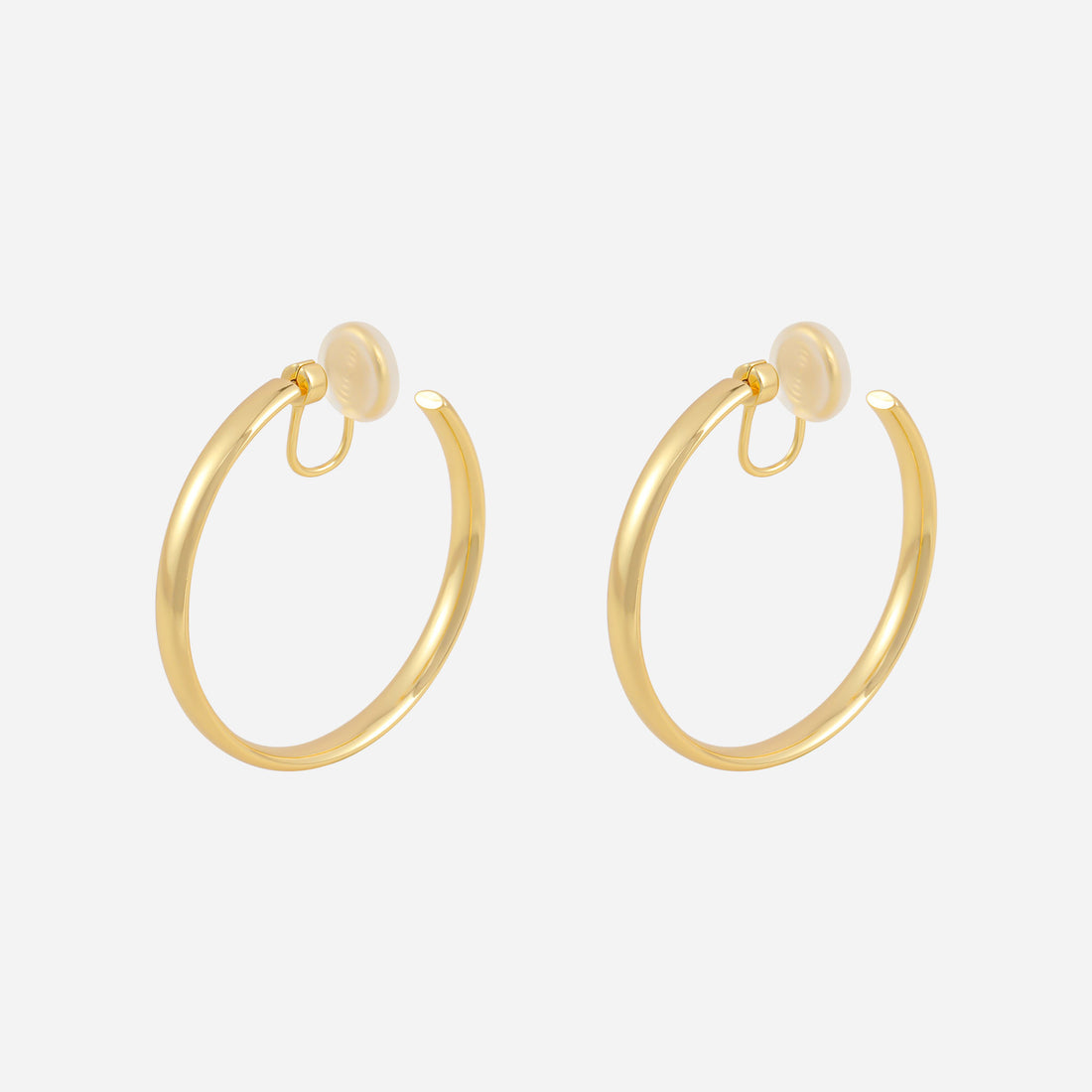 Large Polished Rounded Clip-On Hoop Earrings in gold and silver by SOMIY for non-pierced ears.