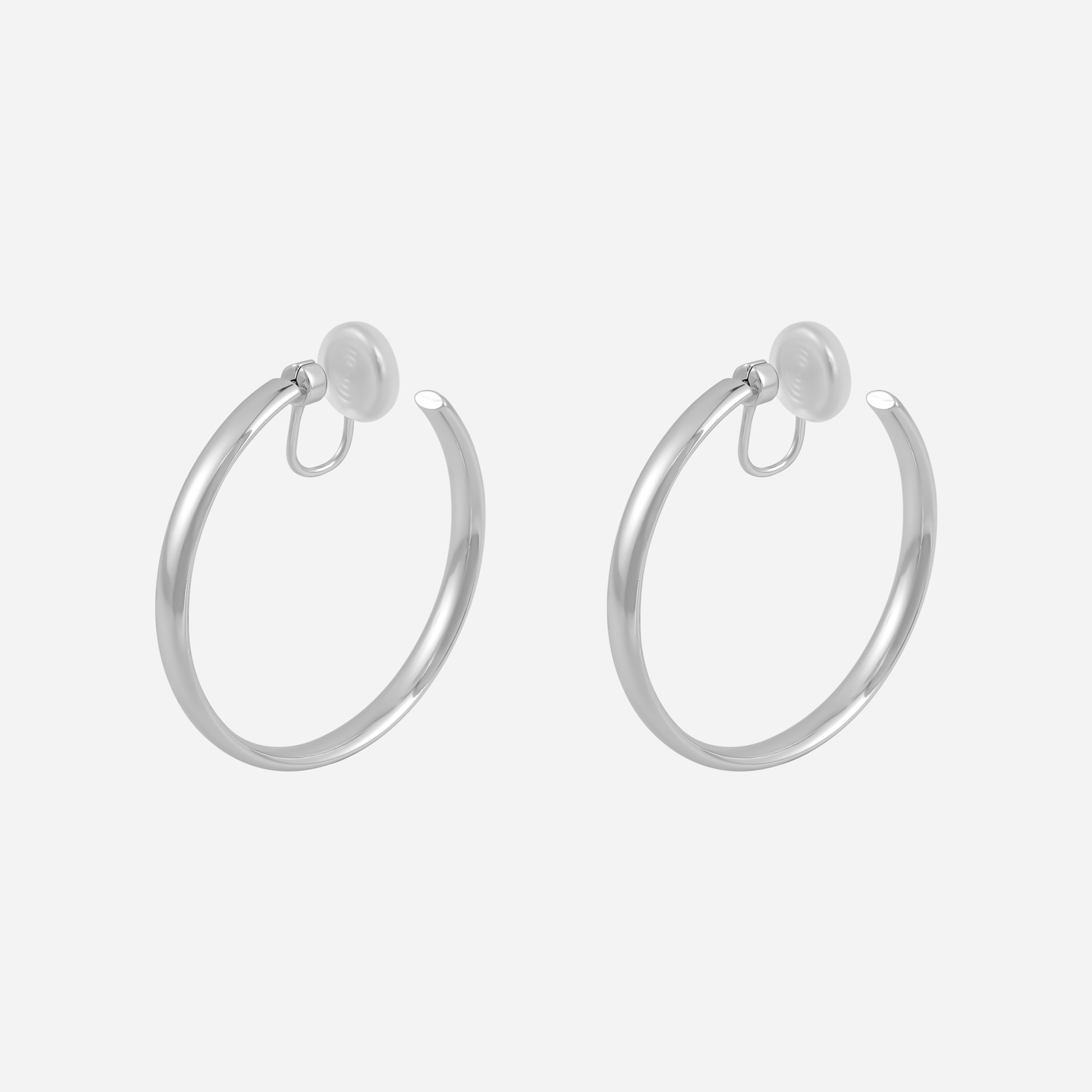 Large Polished Rounded Clip-On Hoop Earrings in gold and silver by SOMIY for non-pierced ears.
