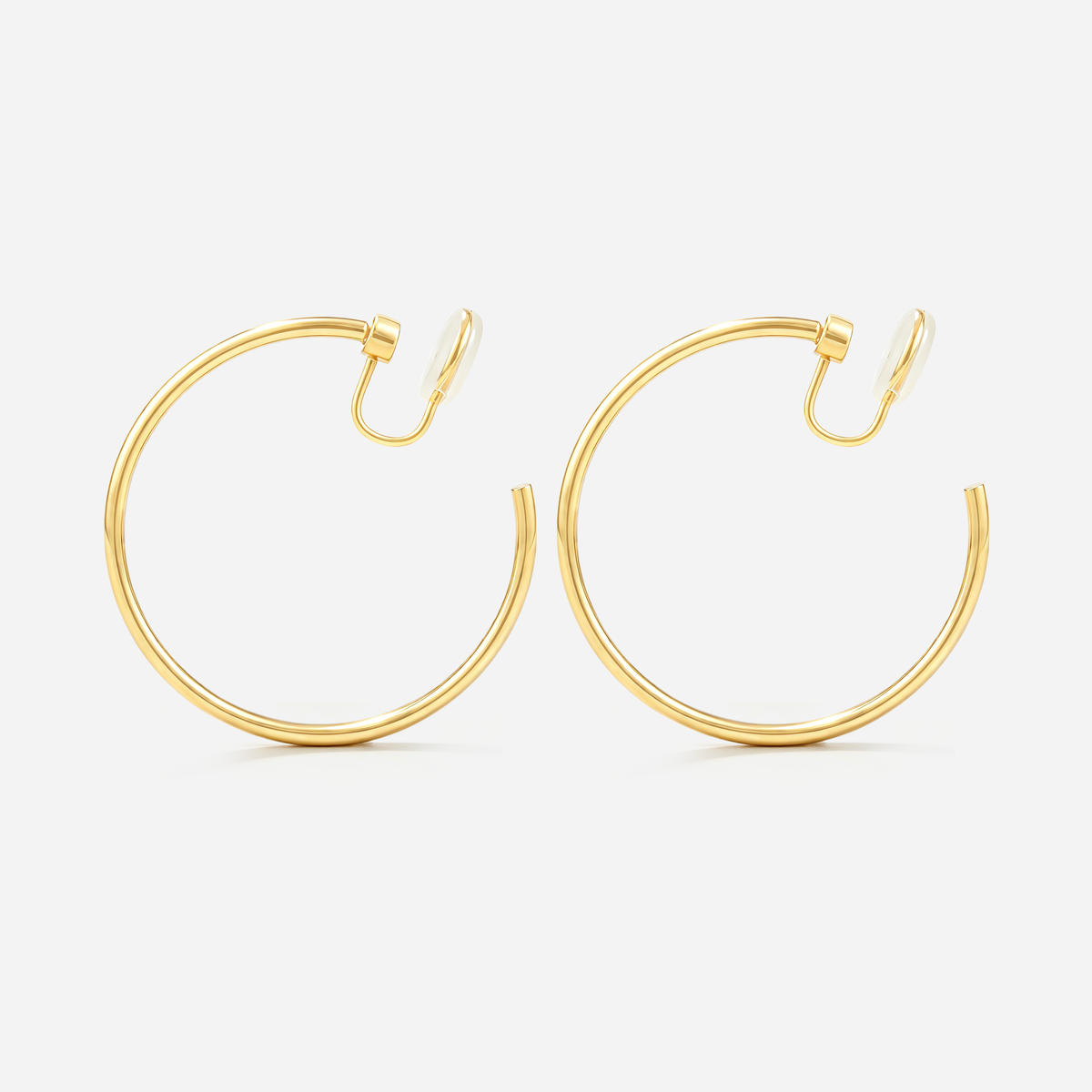 Large Circle Clip-On Earrings in gold by SOMIY