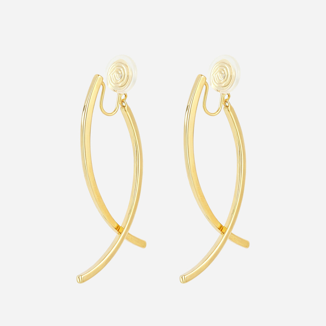 Gold curved dangle clip-on earrings with crossed polished bars and cushioned coil backs, angled pair view