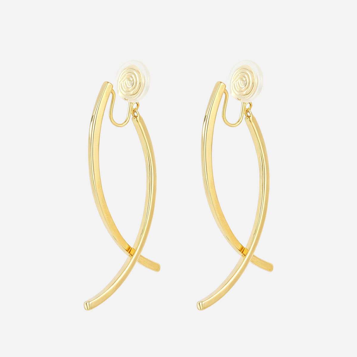 Gold curved dangle clip-on earrings with crossed polished bars and cushioned coil backs, angled pair view