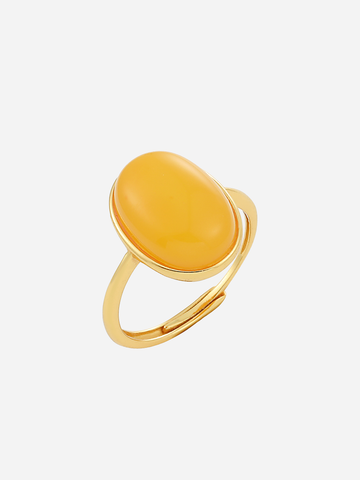 Ethereal Oval butterscotch amber ring with a smooth gold bezel and open band