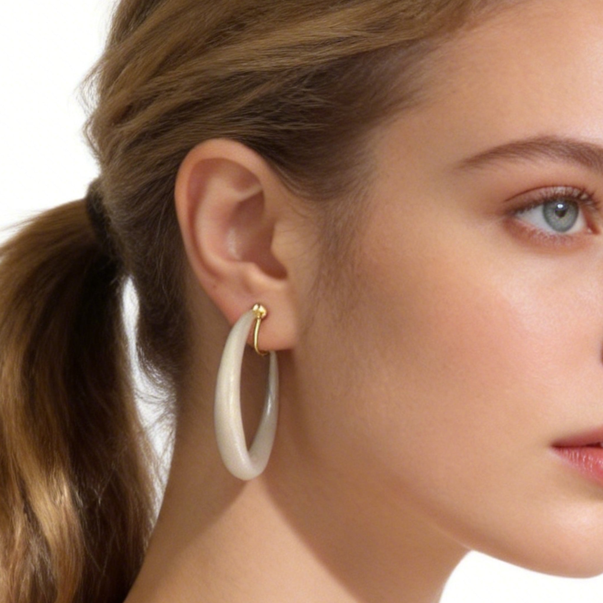 Large Sleek Classic Clip-On Hoop Earrings in 18K gold plating by SOMIY for non-pierced ears.