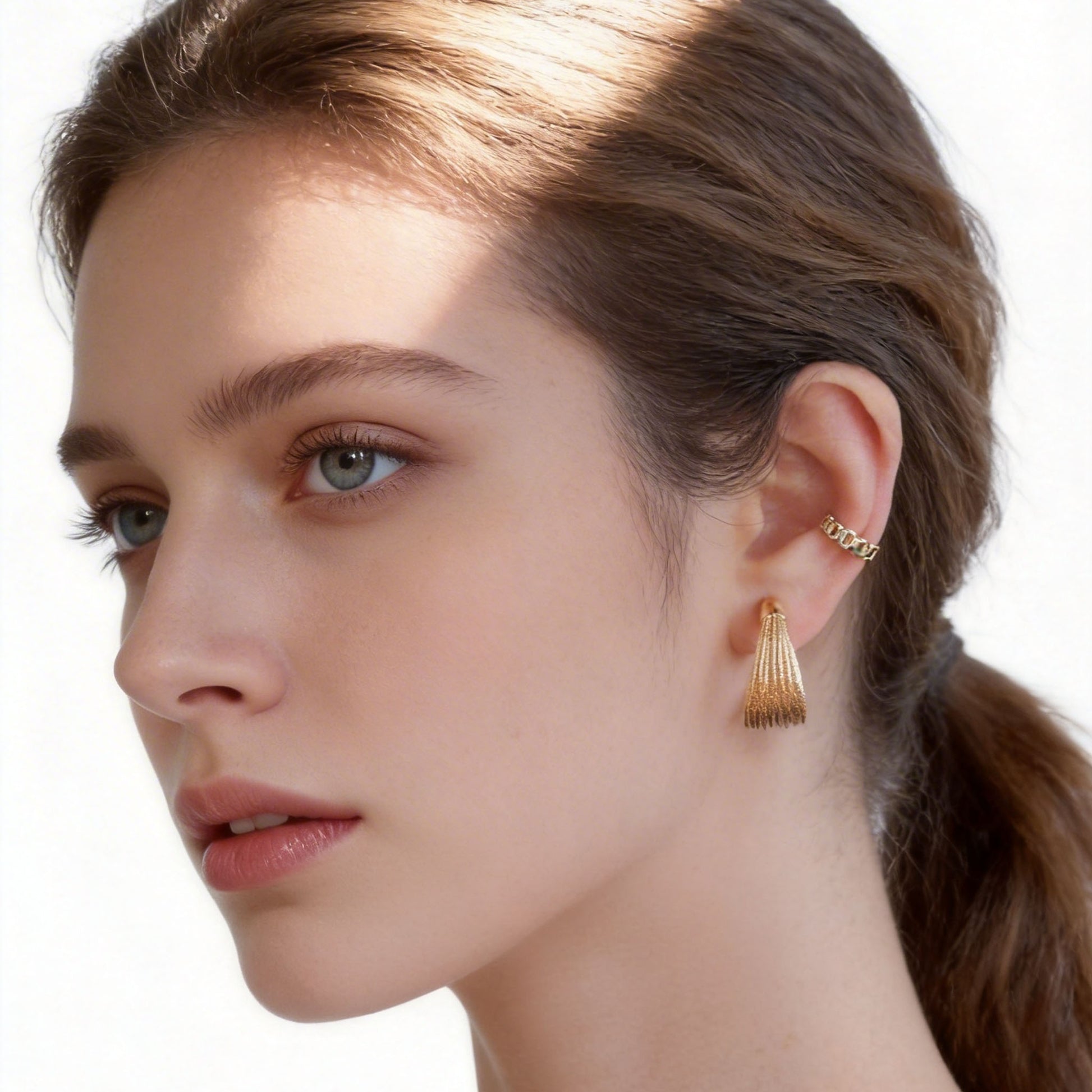 Polished Flat Clip-On Hoop Earrings in gold and silver by SOMIY for non-pierced ears.