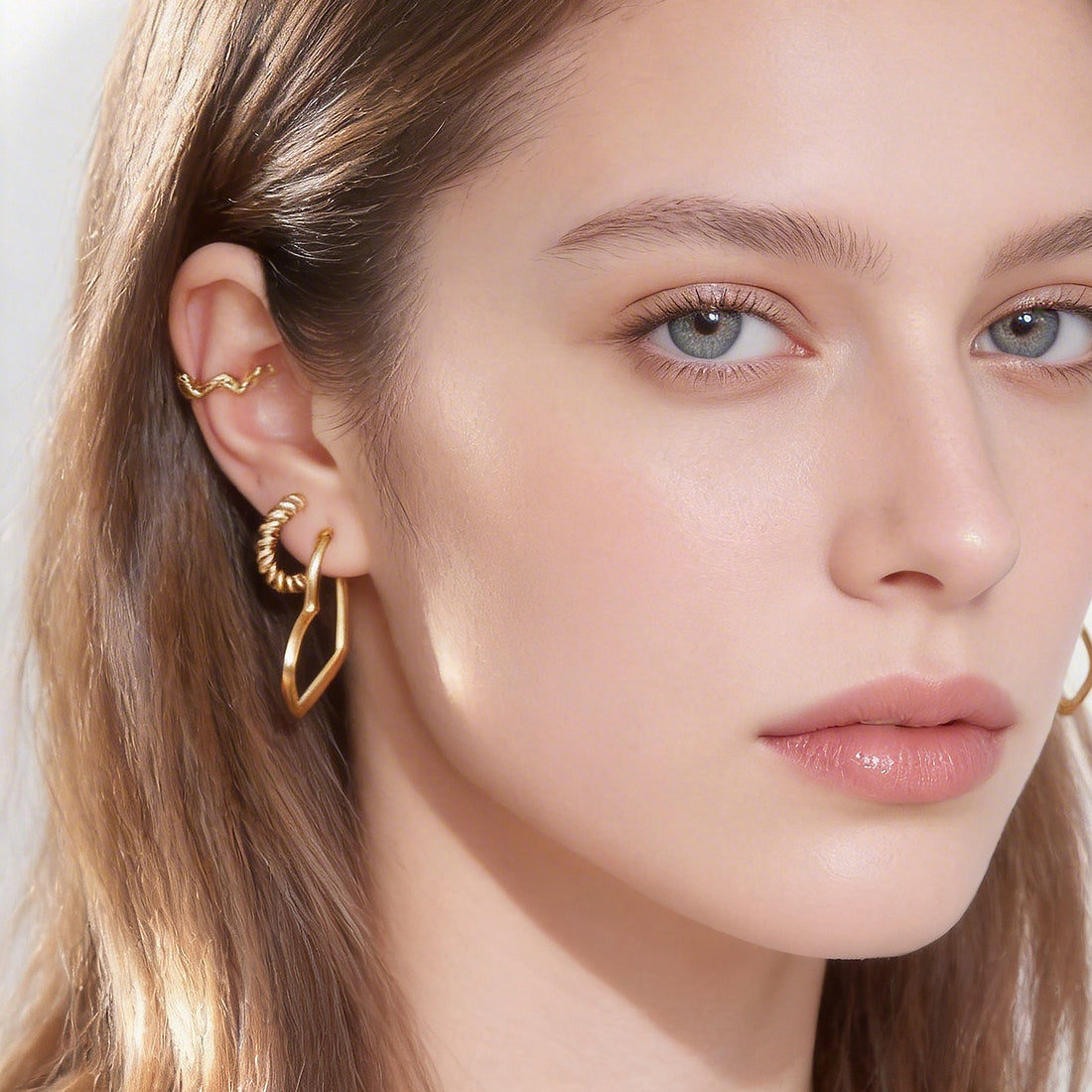 Midi Polished Classic Clip-On Hoop Earrings in 18K gold and silver by SOMIY for non-pierced ears.
