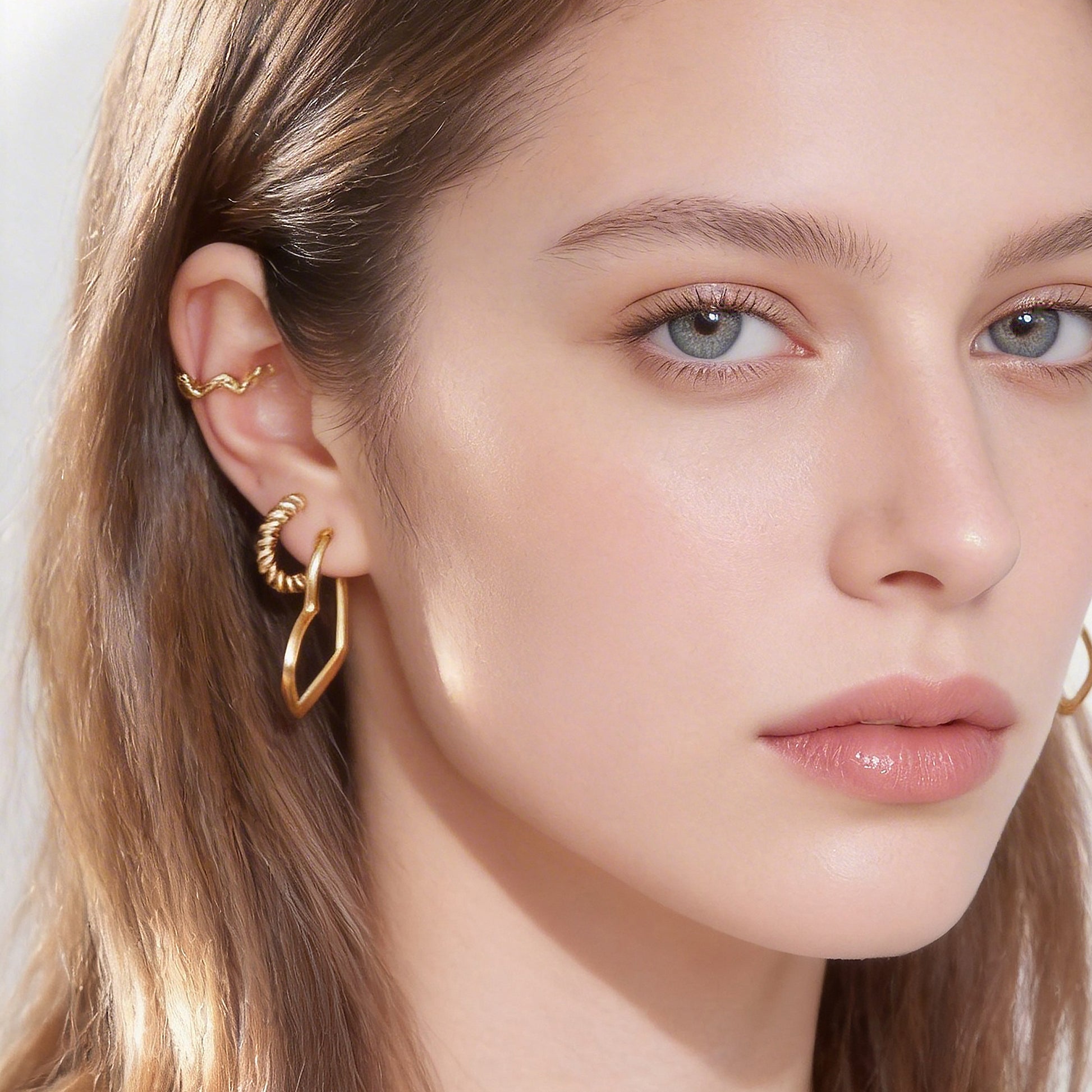 Midi Polished Classic Clip-On Hoop Earrings in 18K gold and silver by SOMIY for non-pierced ears.
