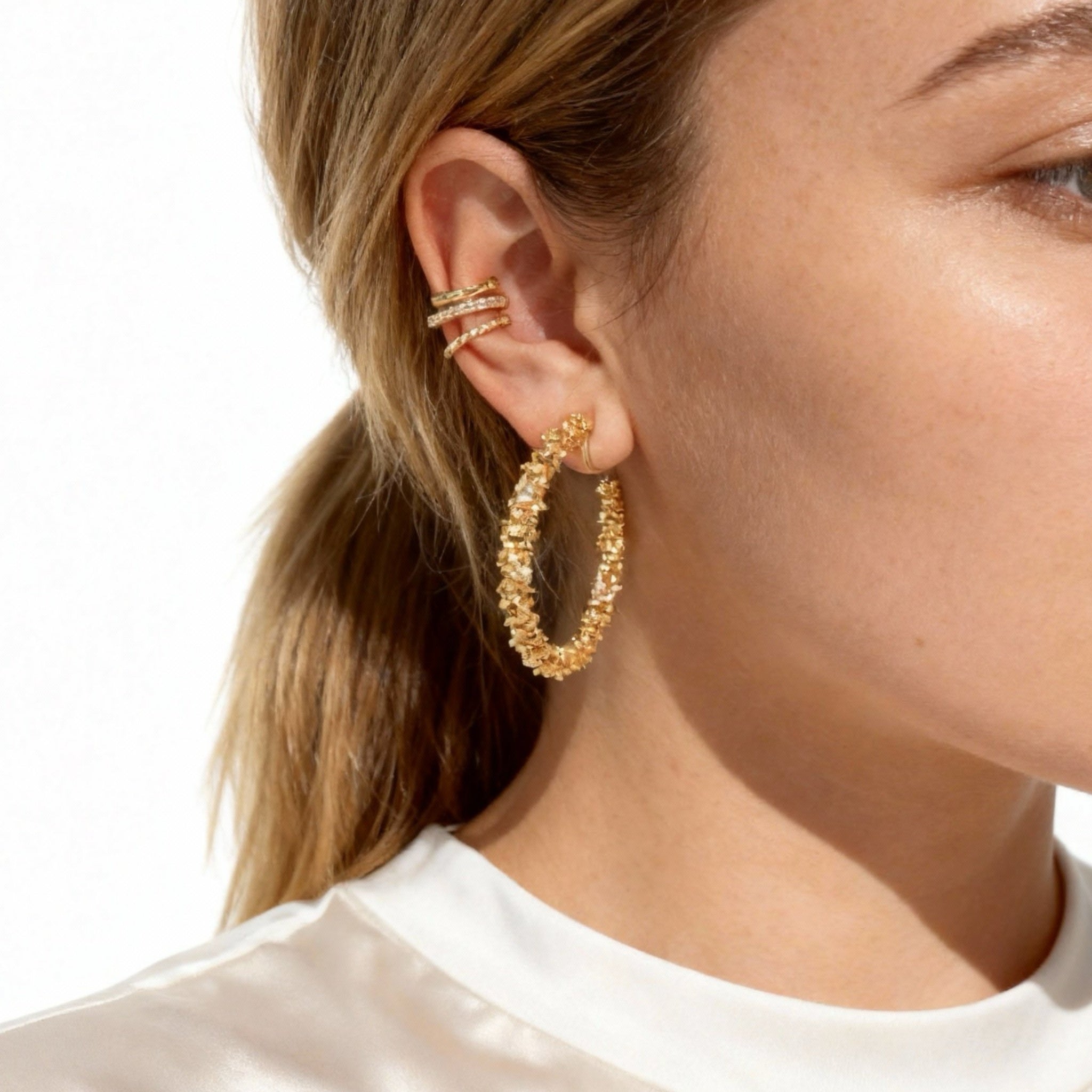 Trefaldig öronmanschett