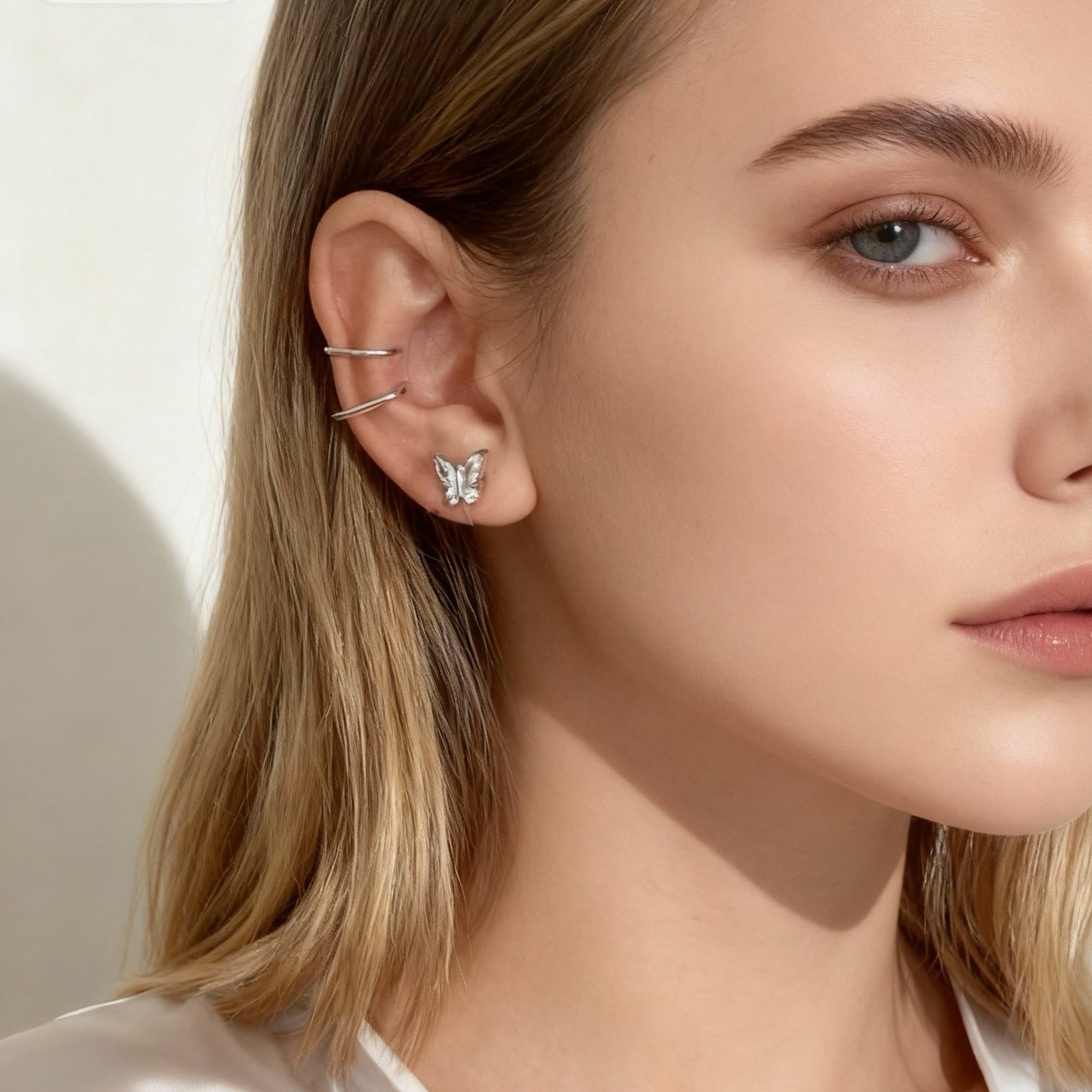 Fjäril och diamant clipsörhängen