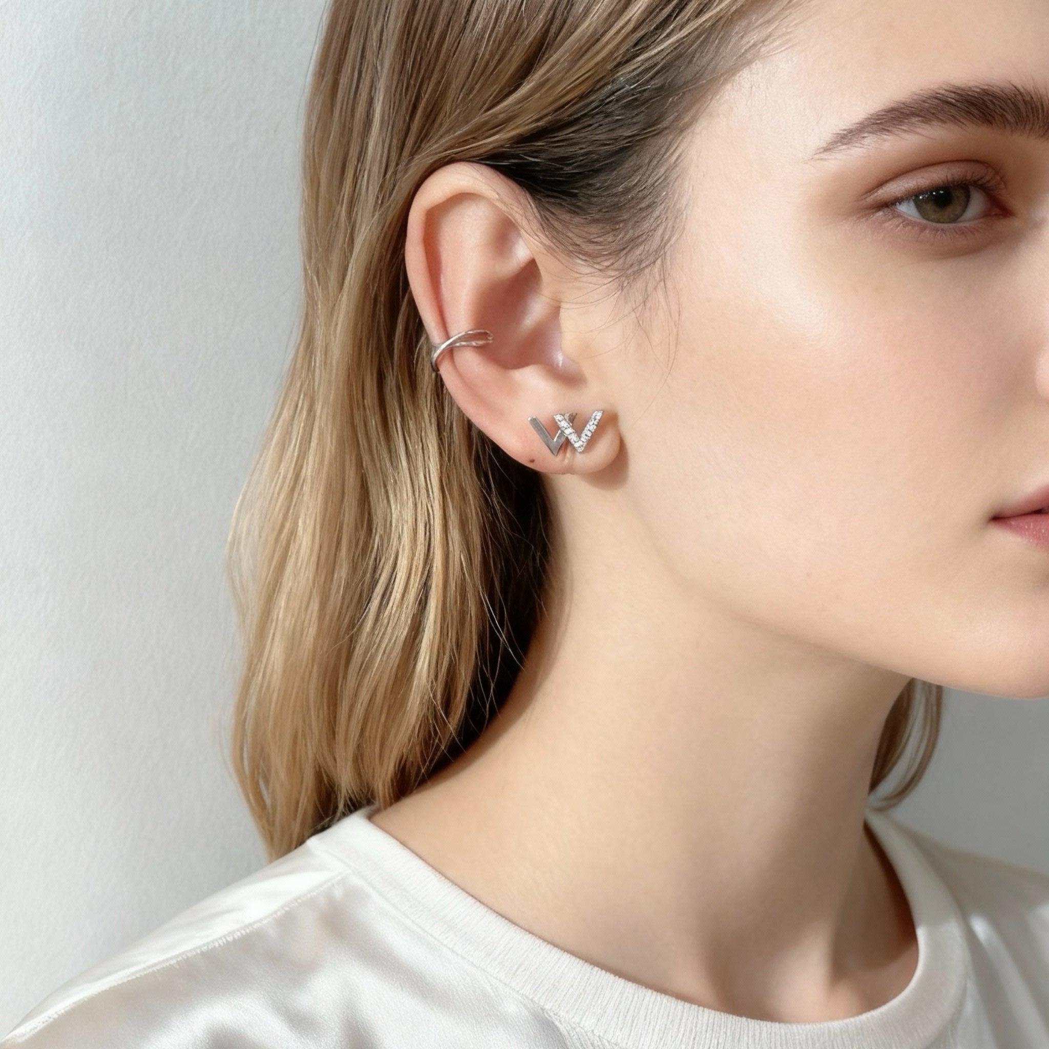 Öronmanschett för korsning