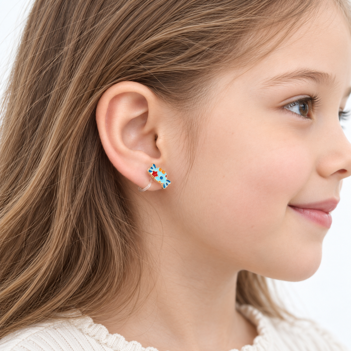 Starry Blue Fish Clip-On Earrings - worn on the ear