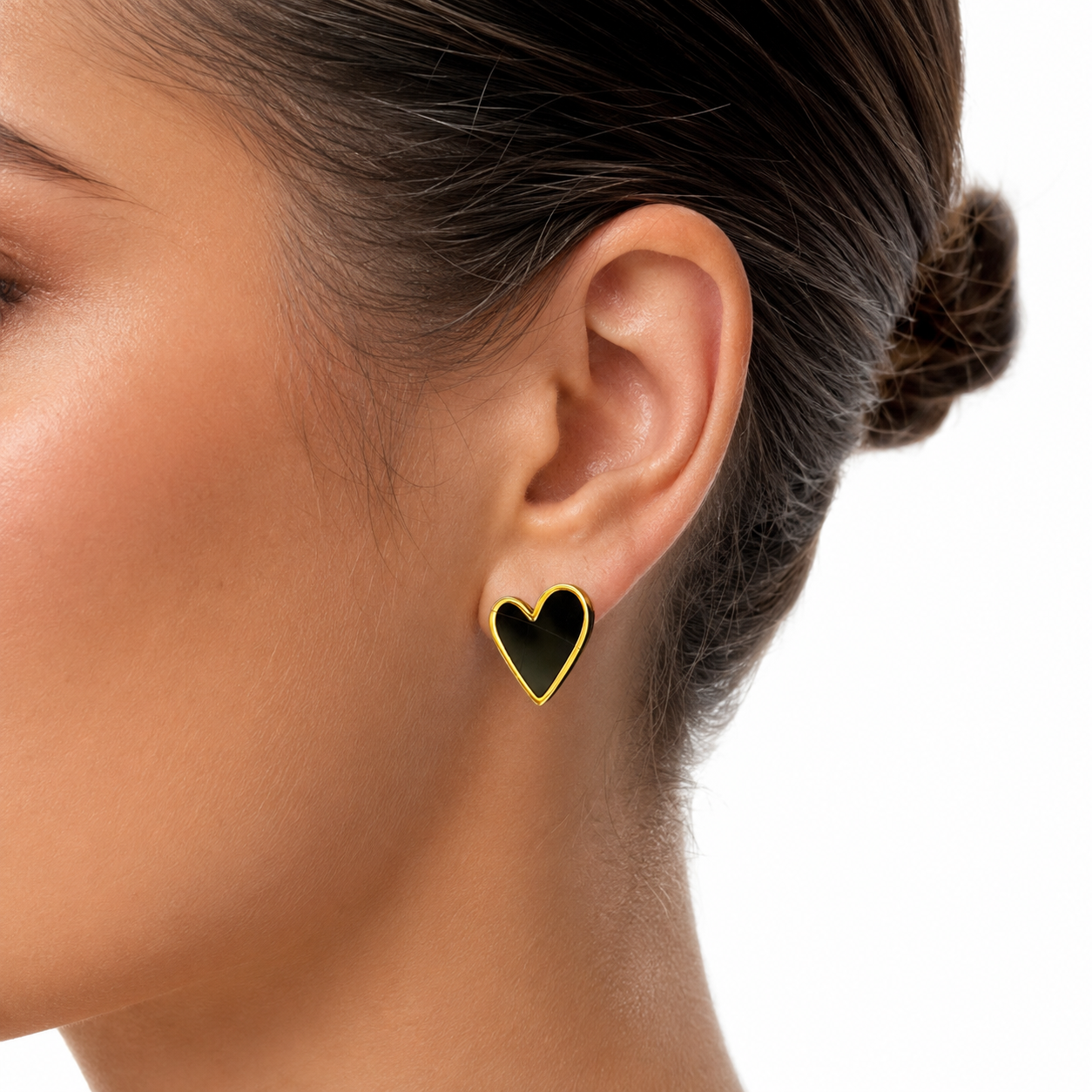 Black Enamel Heart Clip-On Earrings in Gold worn on model close view