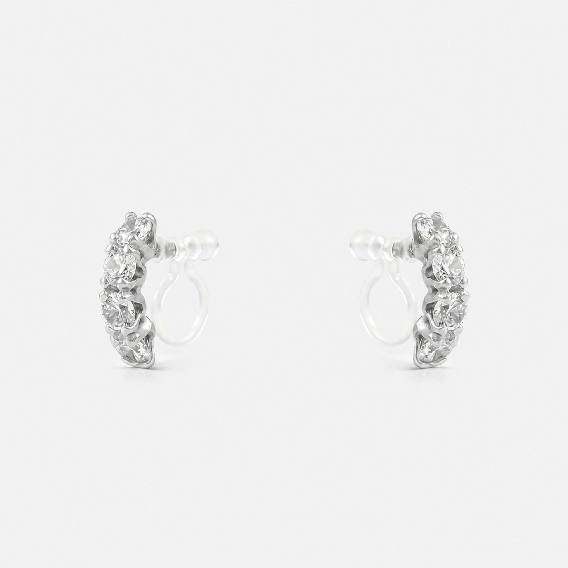 Silver crescent crystal clip-on stud earrings with invisible resin clips | SOMIY