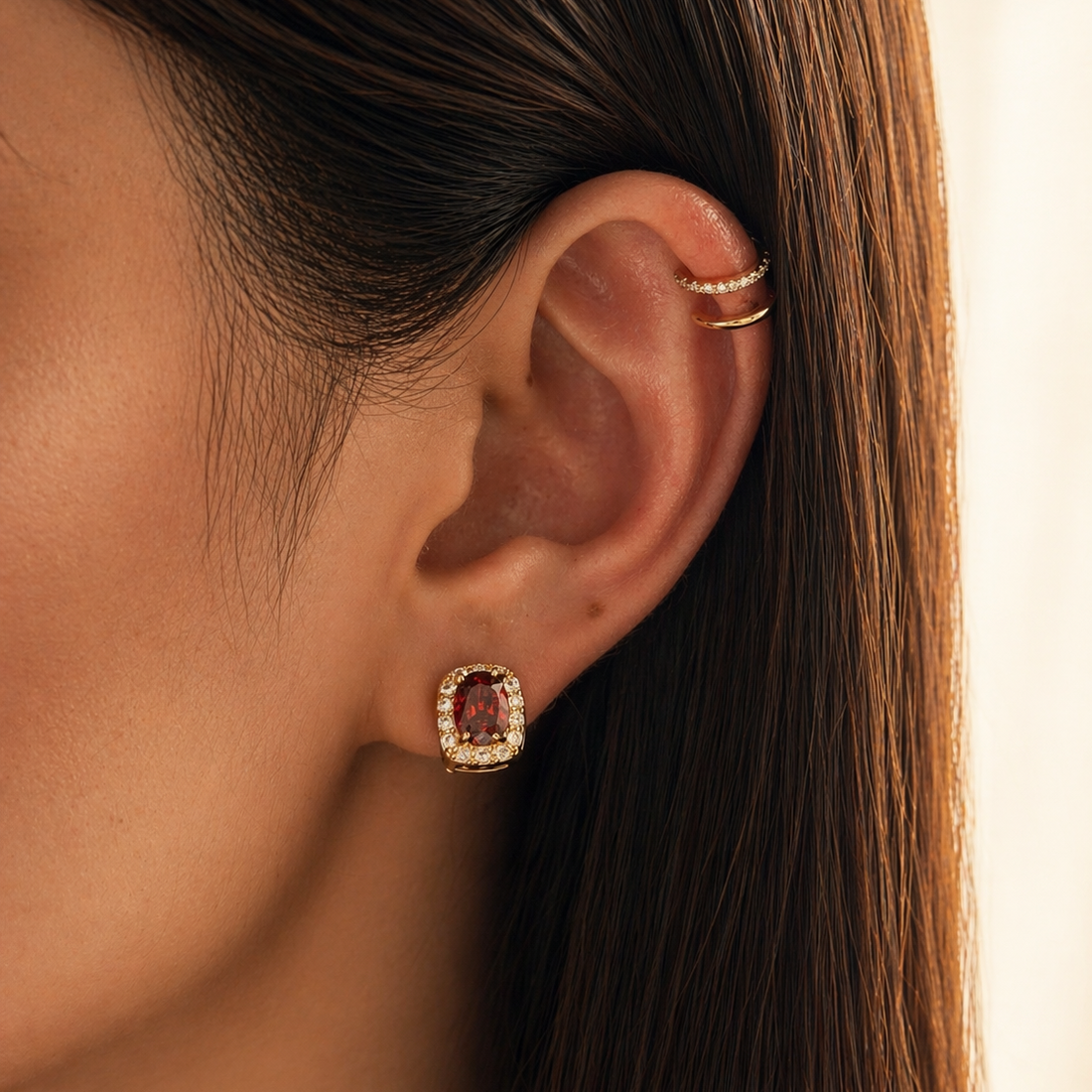 Petite red rounded-rectangle halo clip-on studs in gold settings