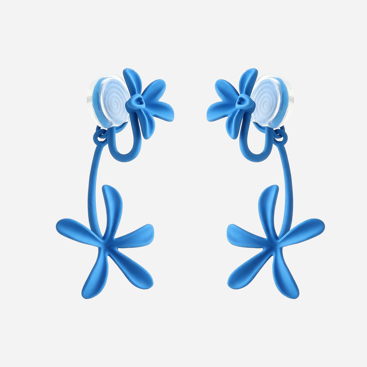 Blue gardenia earrings with silicone-covered brass and cushioned coil clips, rear view