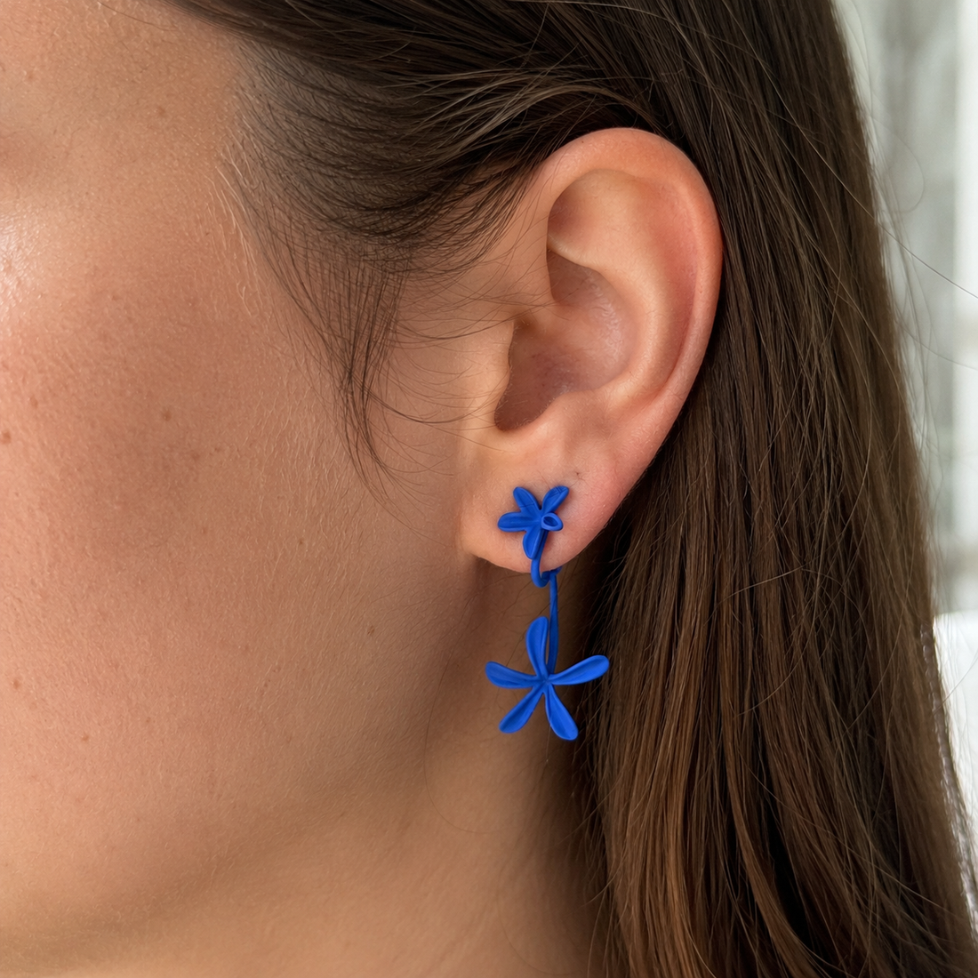 Matte Klein blue gardenia clip-on drop earrings, front view