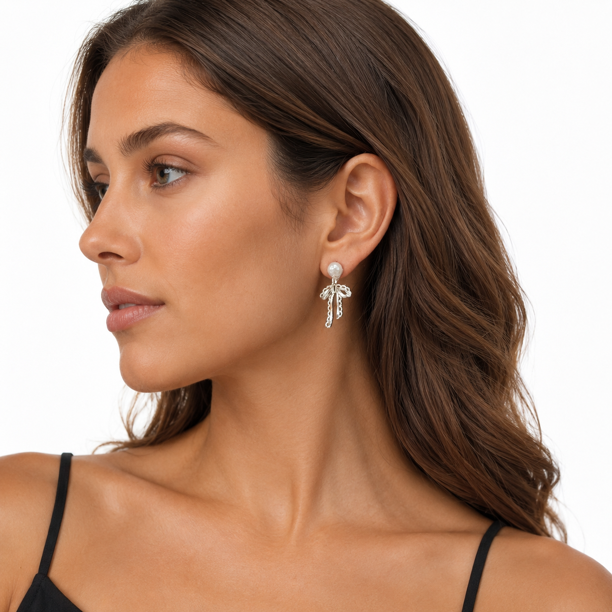Model wearing Lace Bow Pearl Clip-On Dangle Earrings profile view