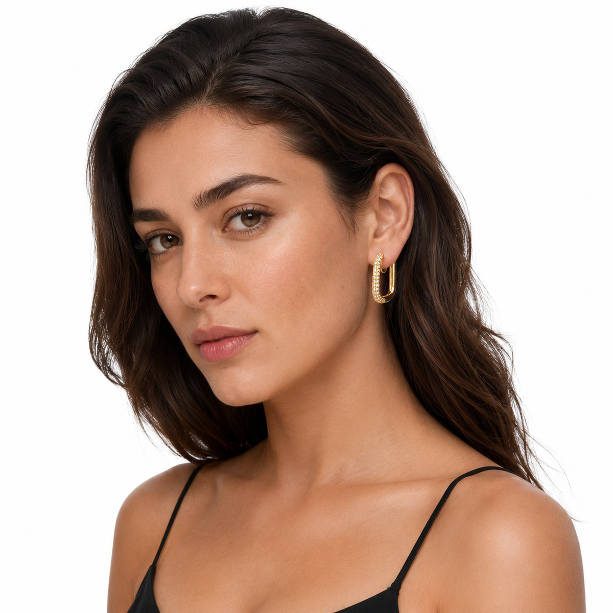 Model wearing a gold pavé rectangle clip-on hoop earring with a black camisole