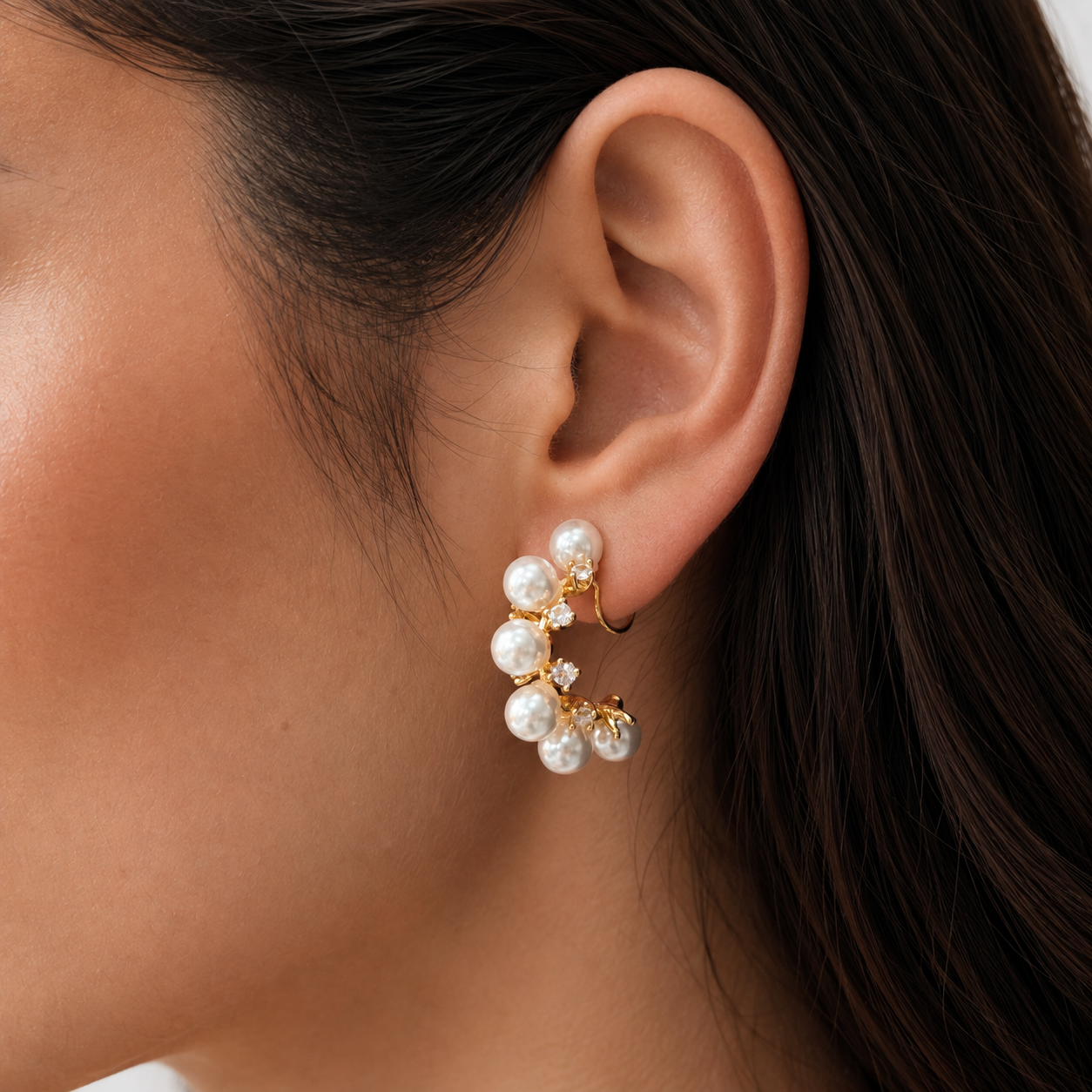Model wearing Pearl Vine Clip-On Hoop Earrings close up