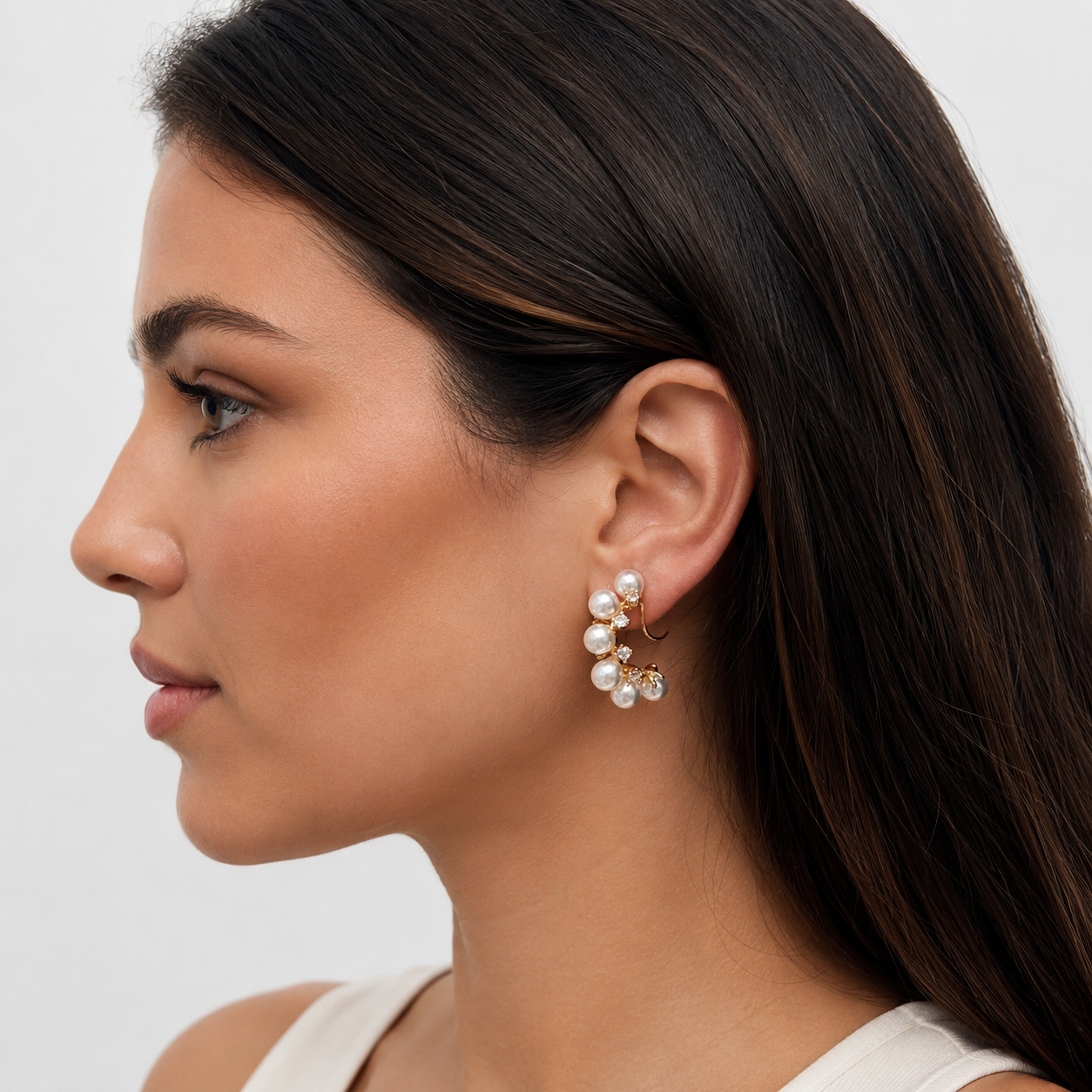 Model wearing Pearl Vine Clip-On Hoop Earrings profile view