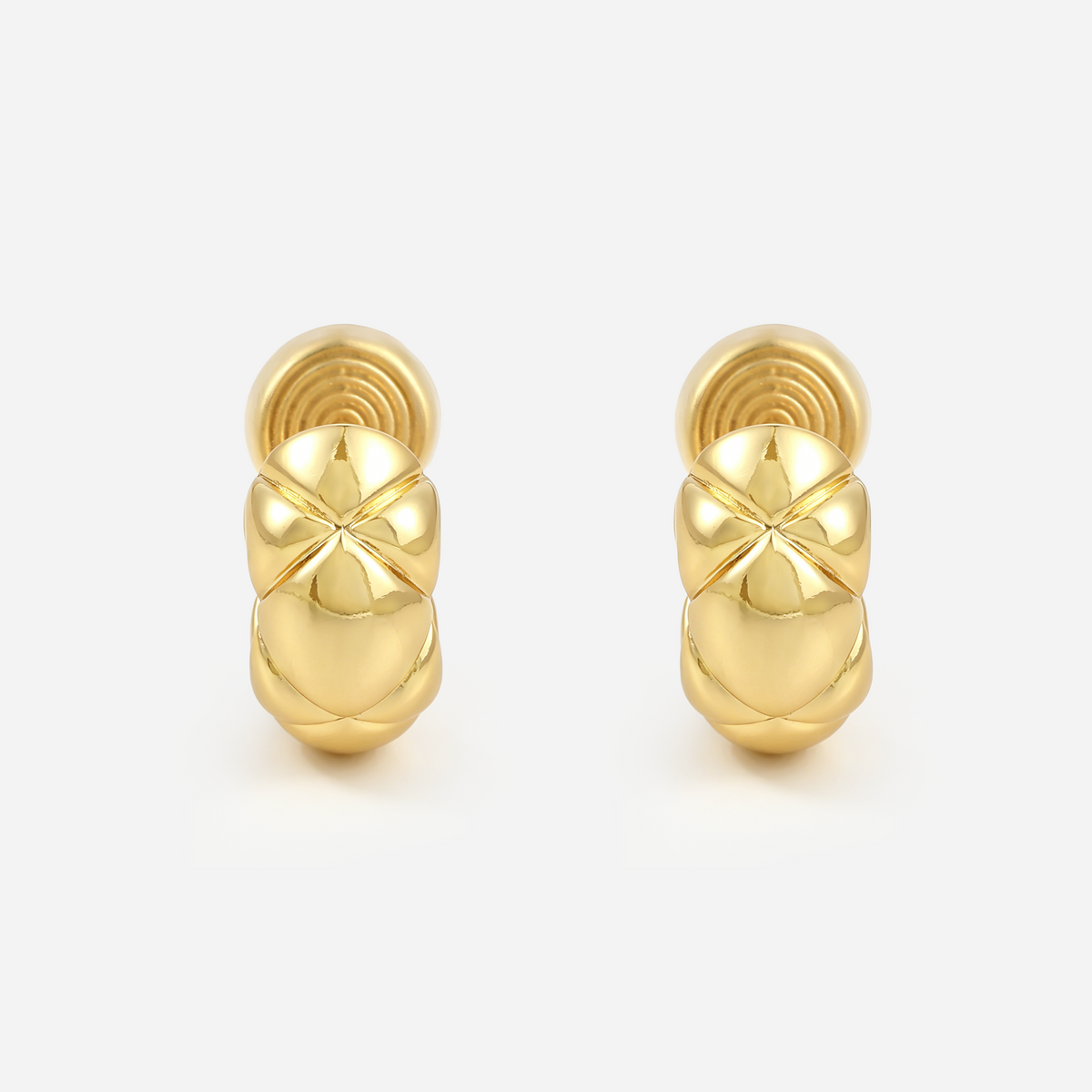 Front view of gold quilted clip-on hoops showing rounded domes and intersecting diagonal grooves