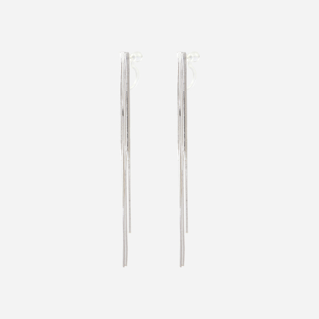 Angled view of SOMIY Layered Chain Tassel Clip-On Dangle Earrings in silver, showing the clear resin clips