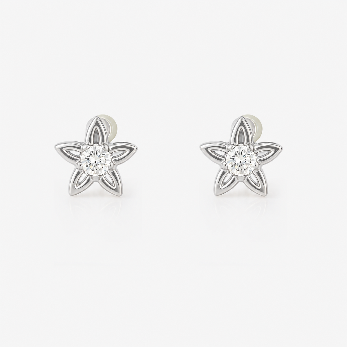 Mini Star CZ Clip-On Stud Earrings in silver by SOMIY