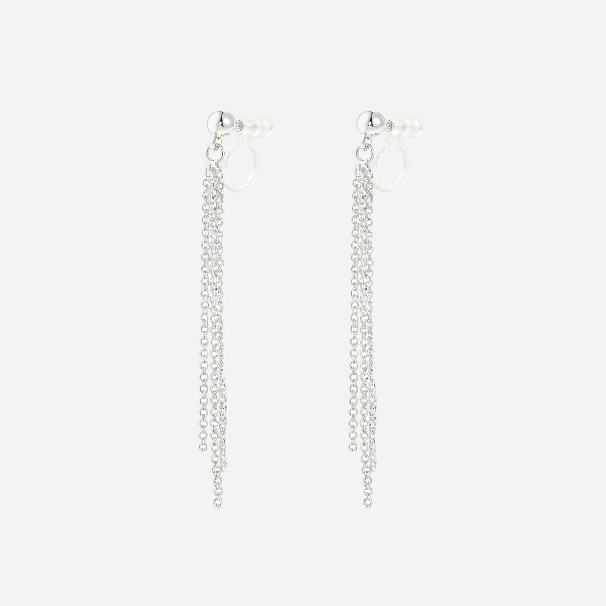 Angled view of SOMIY Round Top Chain Tassel Clip-On Dangle Earrings in silver, showing the clear resin clips