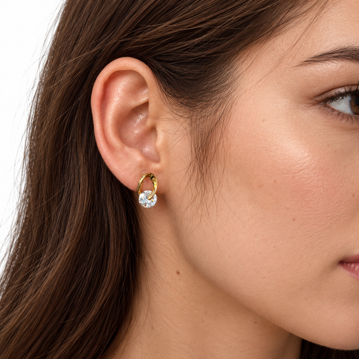 Close-up of SOMIY Solitaire Loop Clip-On Stud Earrings in gold worn on the ear