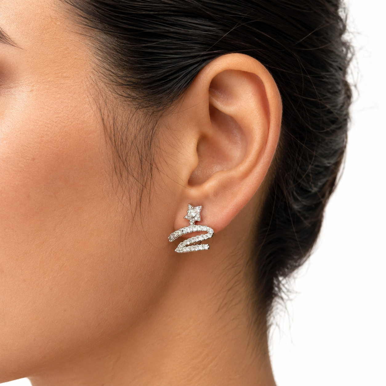 Model wearing Star Swirl Crystal Clip-On Stud Earrings close up