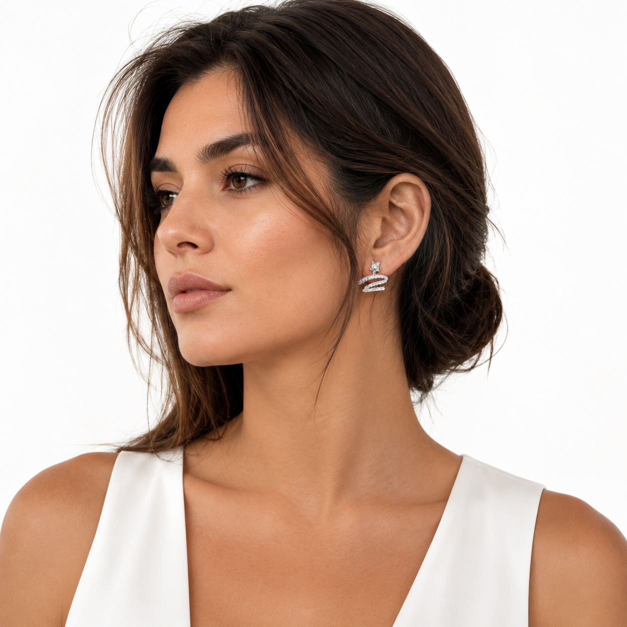 Model wearing Star Swirl Crystal Clip-On Stud Earrings profile view