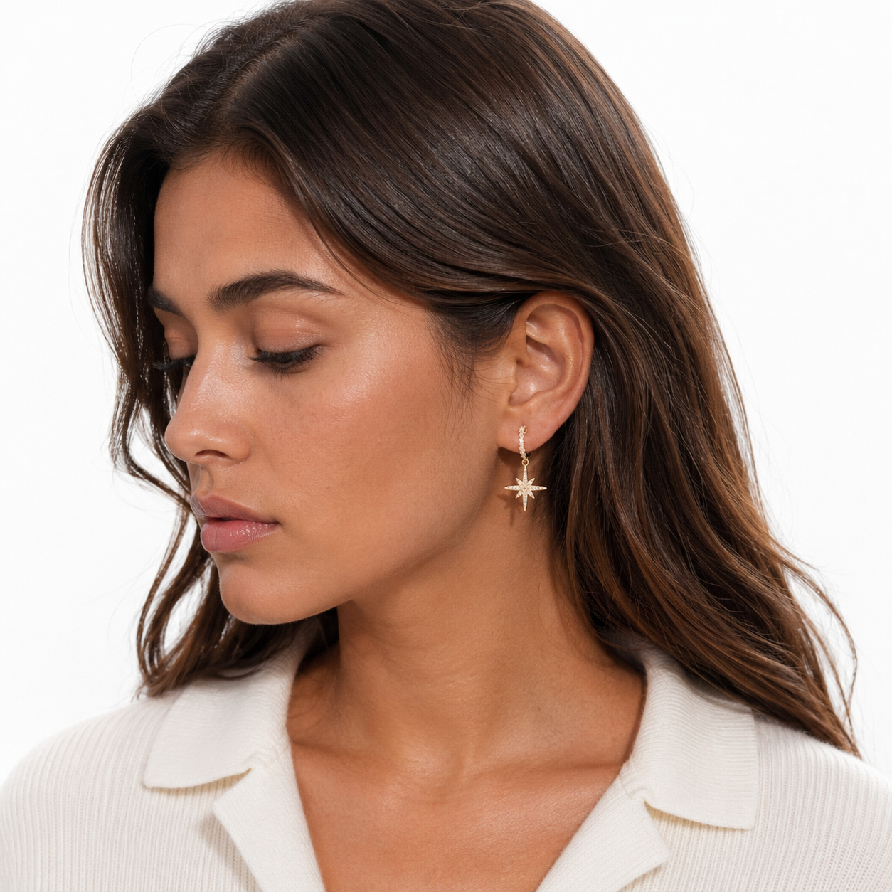 Model wearing Starburst Crystal Clip-On Dangle Earrings in gold profile view